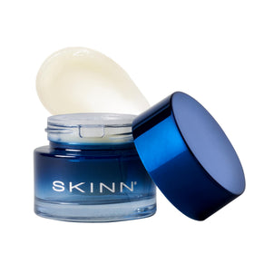 SKINN front packaging showing compact refillable eye balm and branding benefits
