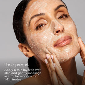 SKINN product held in hand to show 2oz size for scale and portability
