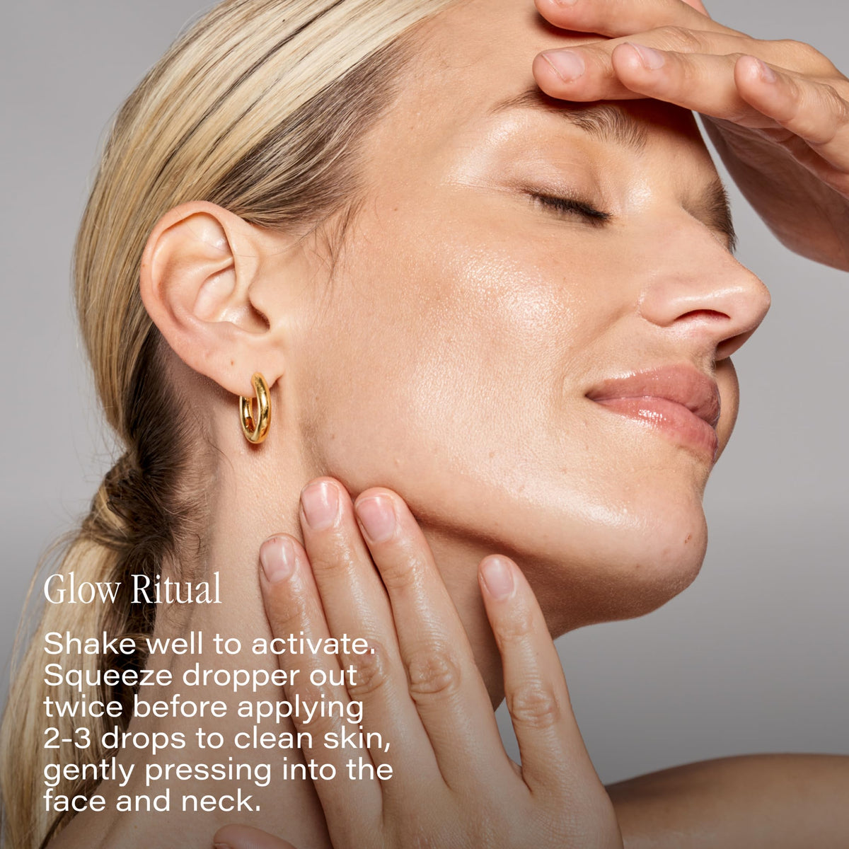 SKINN oil applied to hand showing smooth absorption and hydration