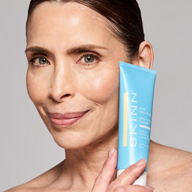 SKINN label close-up highlighting olive oil, enzymes and antioxidant ingredients