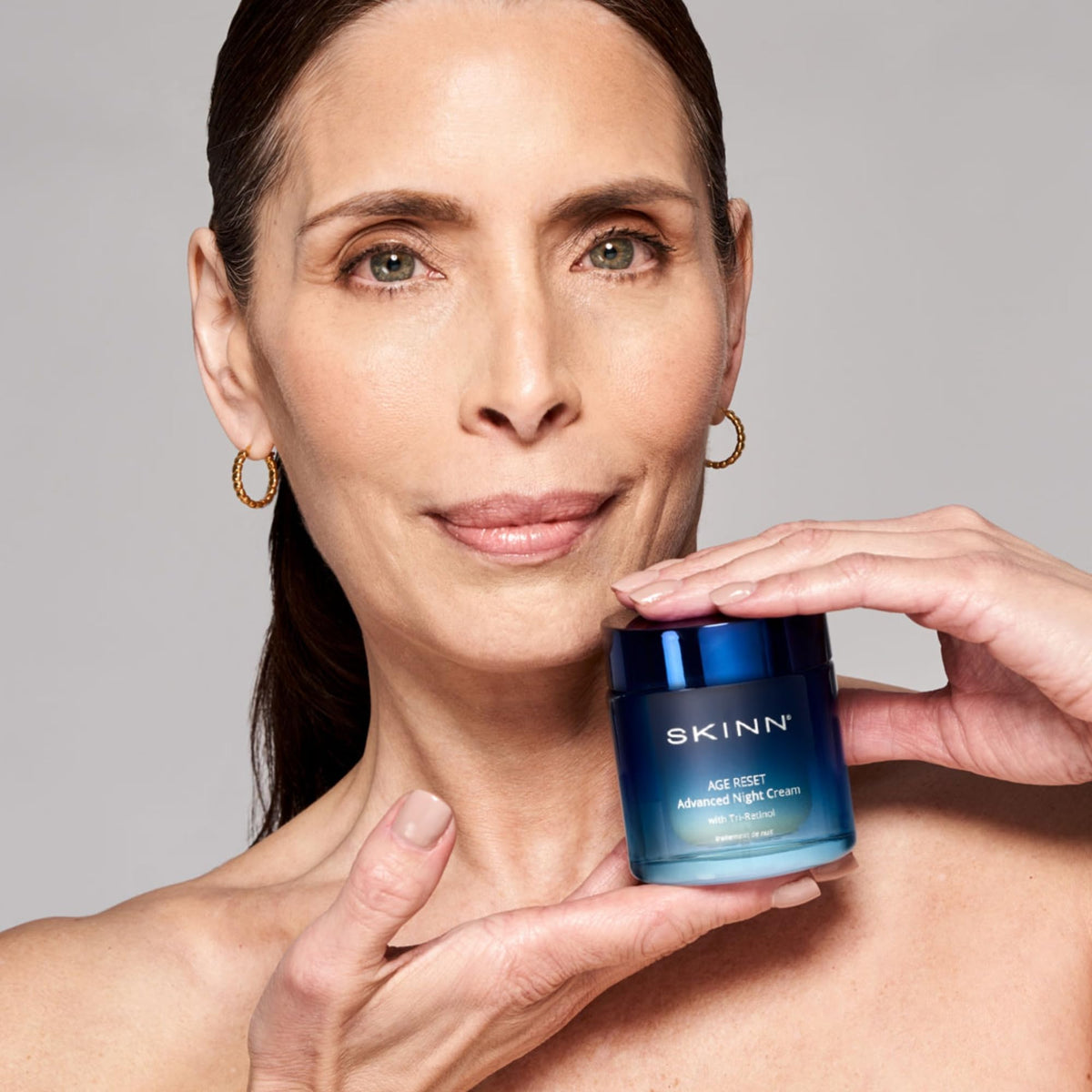 SKINN label close-up listing tri-retinol and peptides for ingredient clarity