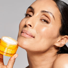 SKINN jar on bathroom vanity in lifestyle setting, suggests daily skincare ritual