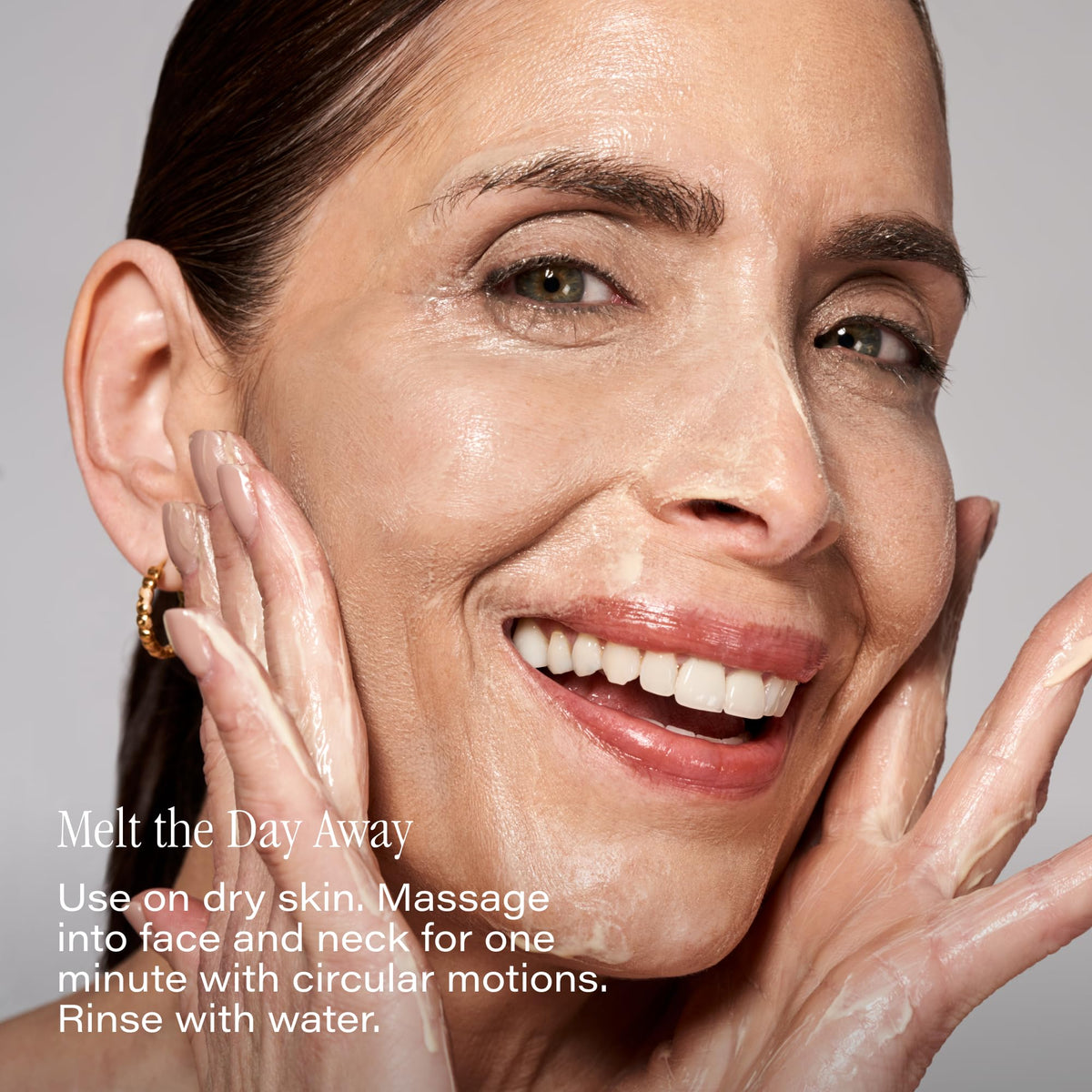 SKINN cream on hand demonstrating spreadability and makeup removal benefit