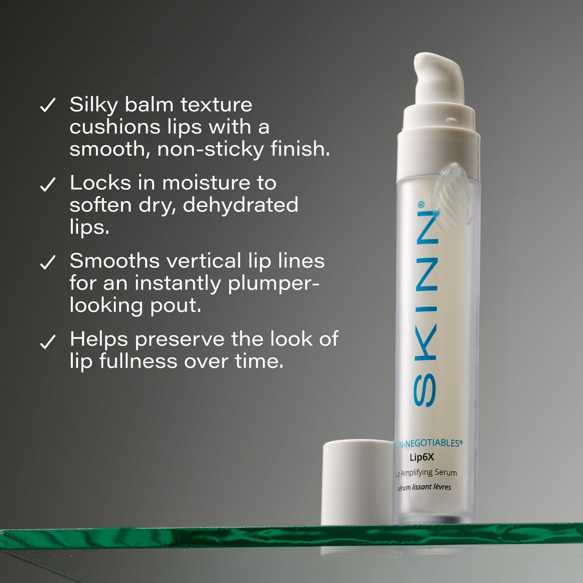 SKINN silky serum texture on fingertip demonstrating cushiony, non-sticky hydration