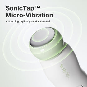 SKNBODY wand head gently contacting under-eye to deliver cooling and massage