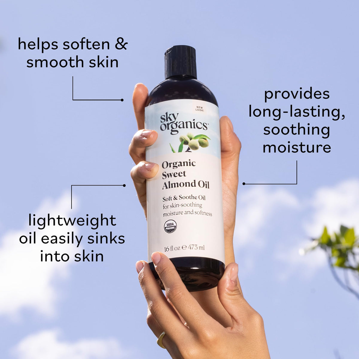 Sky Organics applied to hair ends to illustrate frizz control, shine, and lightweight conditioning