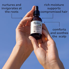 Sky Organics ingredient label showing organic rosemary, jojoba, macadamia benefits