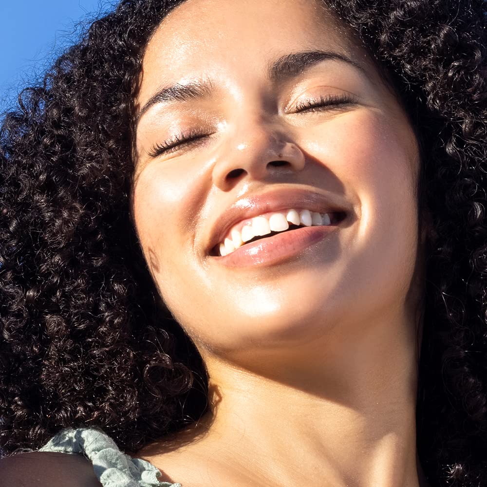 Sky Organics oil pour texture close-up showing smooth absorption and sheen
