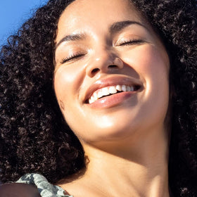 Sky Organics oil pour texture close-up showing smooth absorption and sheen