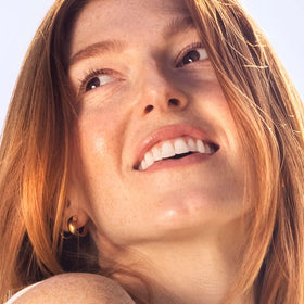 Sky Organics massaged into skin on forearm to show moisturizing and softening