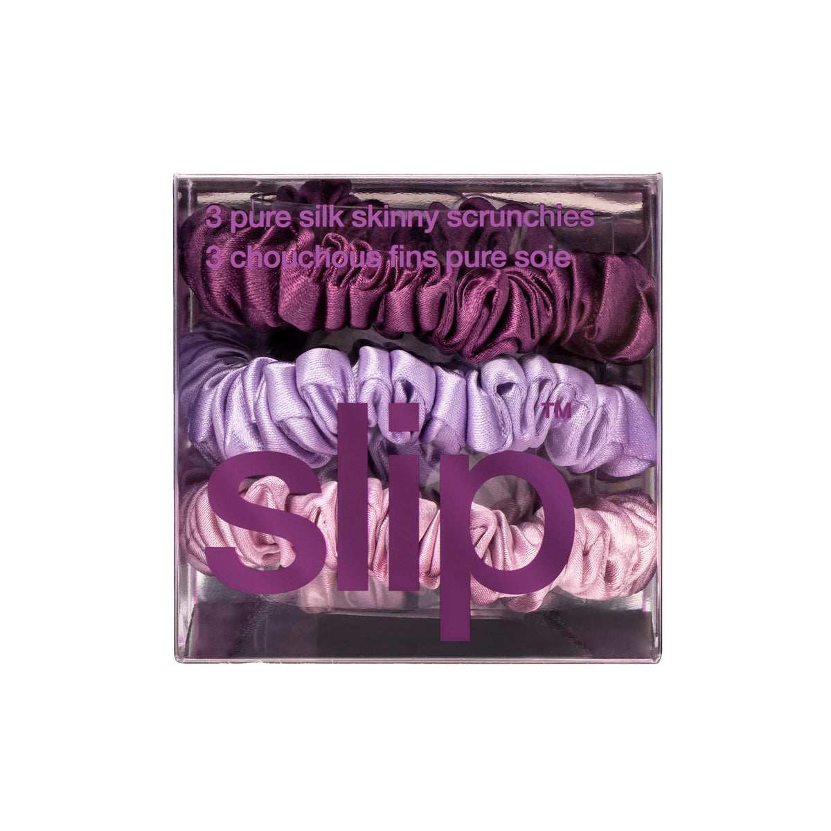 Bedroom scene with SLIP scrunchie on nightstand to show silk care and elegance