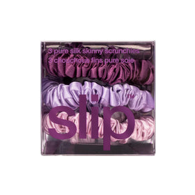 Bedroom scene with SLIP scrunchie on nightstand to show silk care and elegance