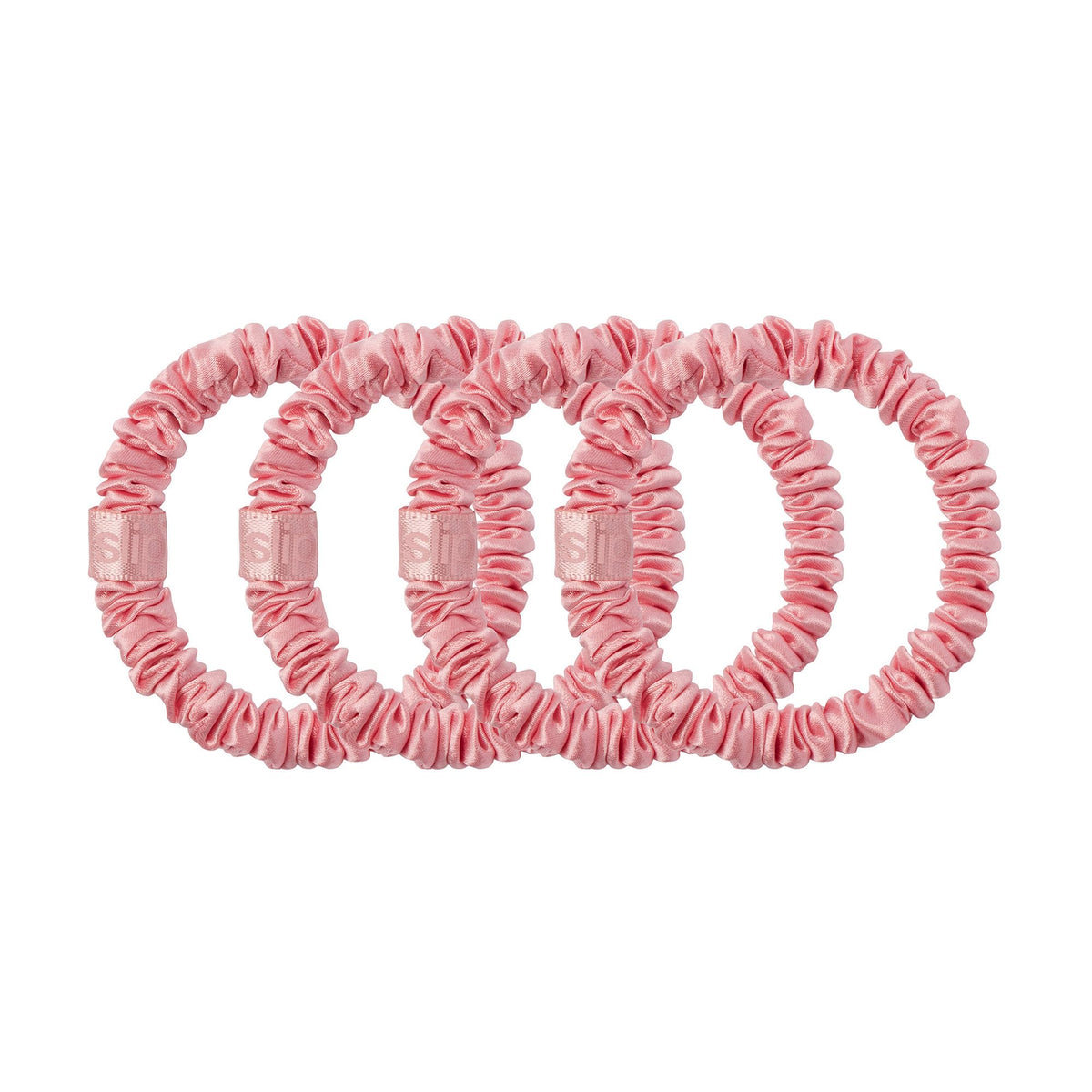 Slip rose scrunchie on varied hair types showing versatile, hair-friendly fit
