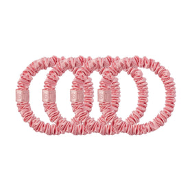 Slip rose scrunchie on varied hair types showing versatile, hair-friendly fit
