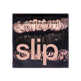 SLIP bundled scrunchies on neutral surface, coordinated colors for versatile styling