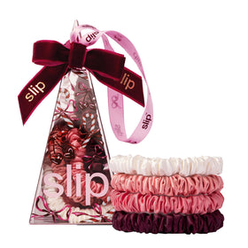 SLIP front packaging showing candy cane ornament and ribbon, gift-ready