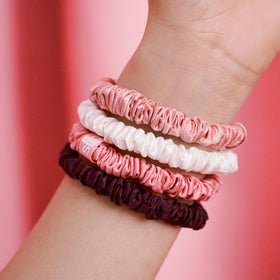 SLIP crimson scrunchie displayed solo, rich color and gentle hold