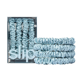 SLIP skinny silk scrunchie front view showing sky blue color and polished finish