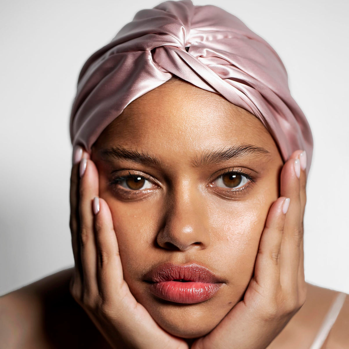 SLIP turban styled with outfit showing chic protection and versatility