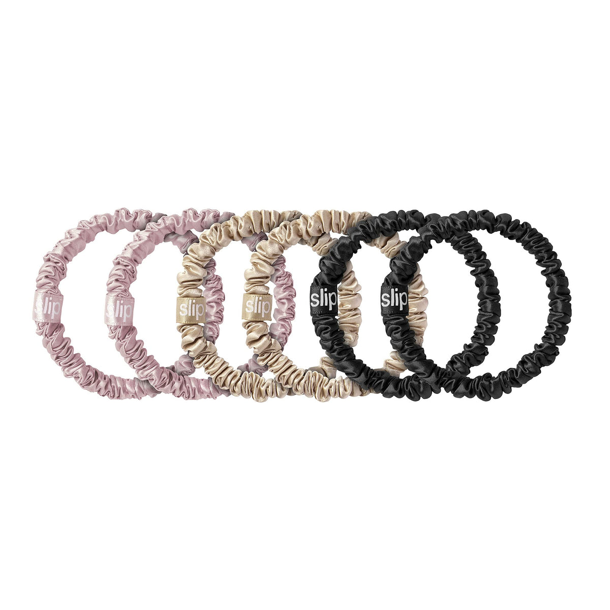 SLIP scrunchie holding a sleek ponytail, secure hold without bulk