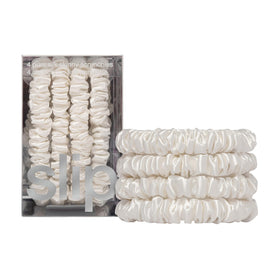 SLIP front packaging showing four skinny silk scrunchies, protective and elegant
