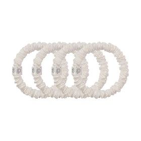 SLIP scrunchie worn on wrist as accessory showing comfort and no tugging
