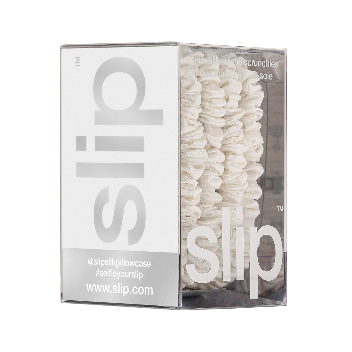 SLIP set of four white skinny scrunchies arranged to show variety and rotation