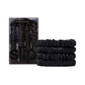 SLIP front packaging showing four black silk hair ties, elegant protection