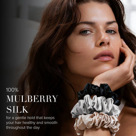 SLIP two black midi scrunchies side by side showing size consistency and styling options
