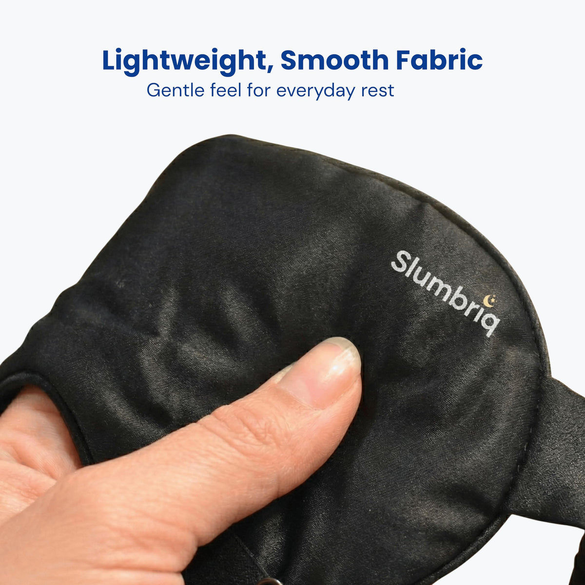 Slumbriq on model lying down illustrating restful blackout comfort