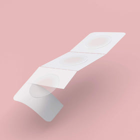 SMARTMED dot next to coin to show size and discreet coverage