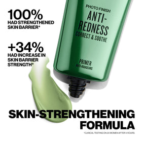 Smashbox green-tinted primer swatch on skin showing immediate redness neutralization