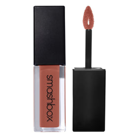 Smashbox product styled in makeup setup conveying professional, studio-ready finish