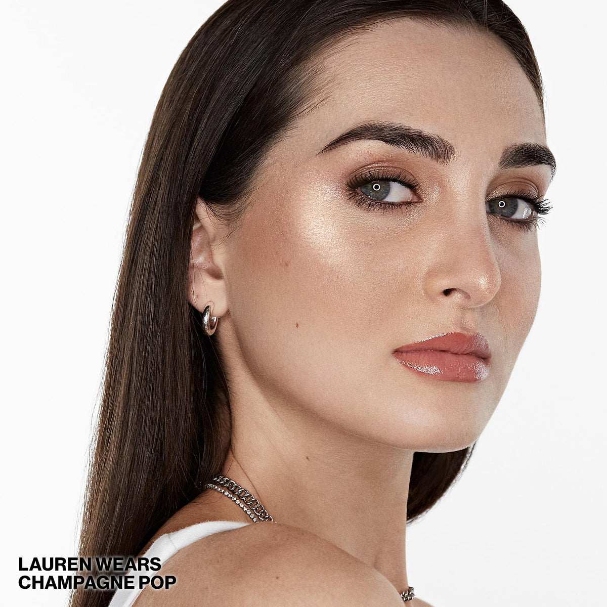 Smashbox x BECCA close-up of highlighter texture showing creamy pearl pigments and blendability
