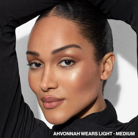 Smashbox brush picking up powders for effortless contour application