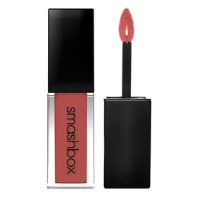 Smashbox in a clutch styling shot showing on-the-go makeup readiness