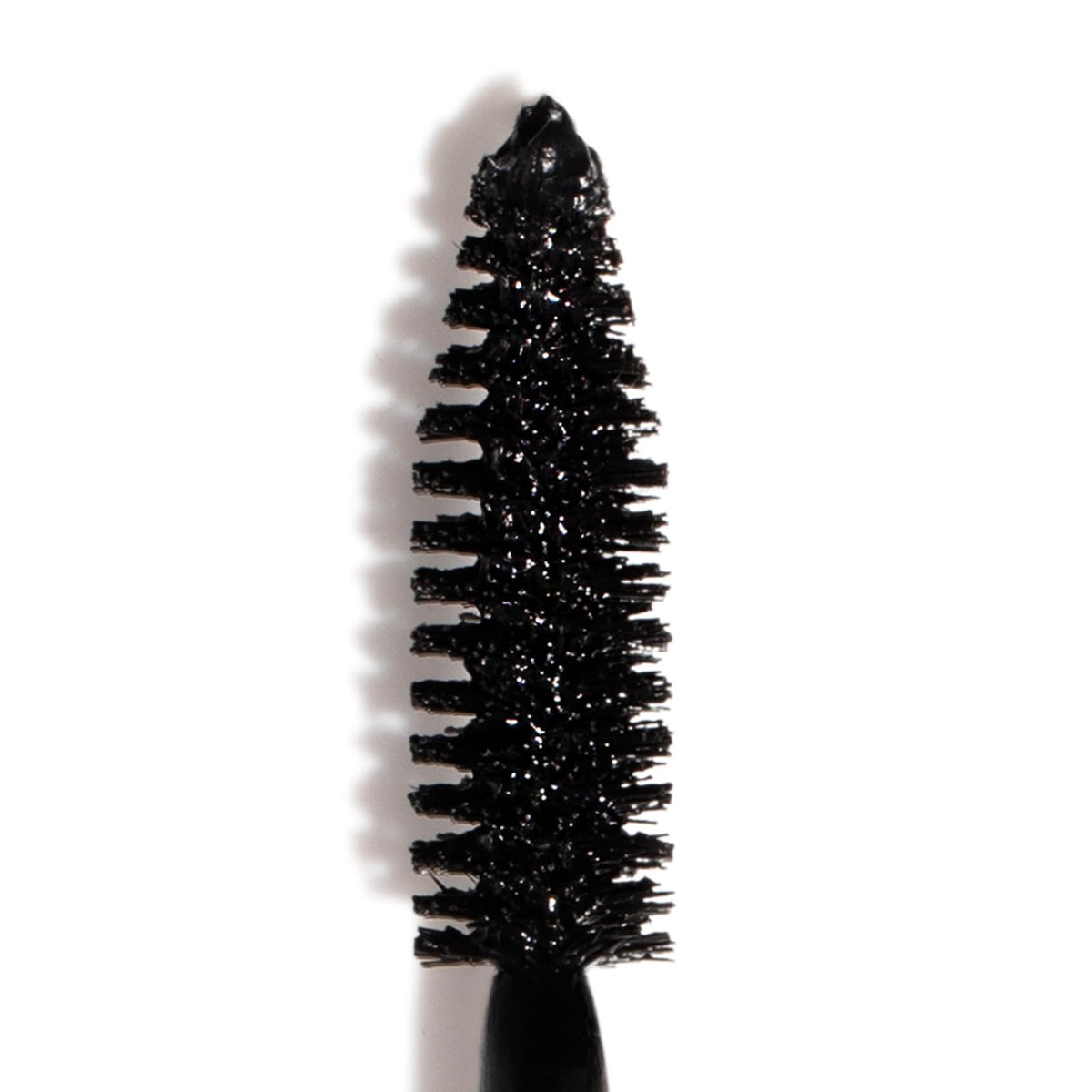 Smashbox tube held in hand showing compact 0.38 fl oz size for travel convenience