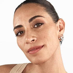 Smashbox before-and-after swipe showing smoother texture and brighter-looking skin