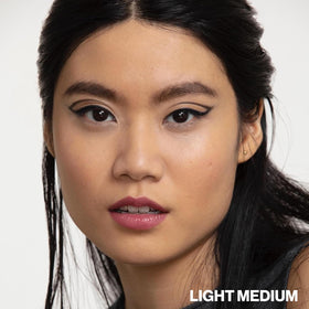 Smashbox with sunscreen visual emphasizing SPF 25 daily protection and environmental defense