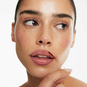 Smooche close-up applied on lips showing vibrant long-lasting color