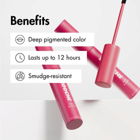 Smooche tube in hand showing size and travel-friendly convenience