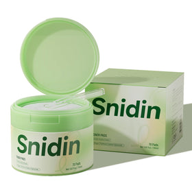 Hand holding Snidin pad for scale showing compact, easy-to-use size