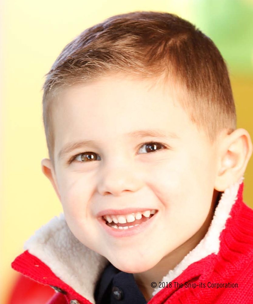 Snip-its styled child hair showing medium hold playful look