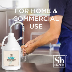 Soapbox gallon next to sink illustrating scale and economical refill