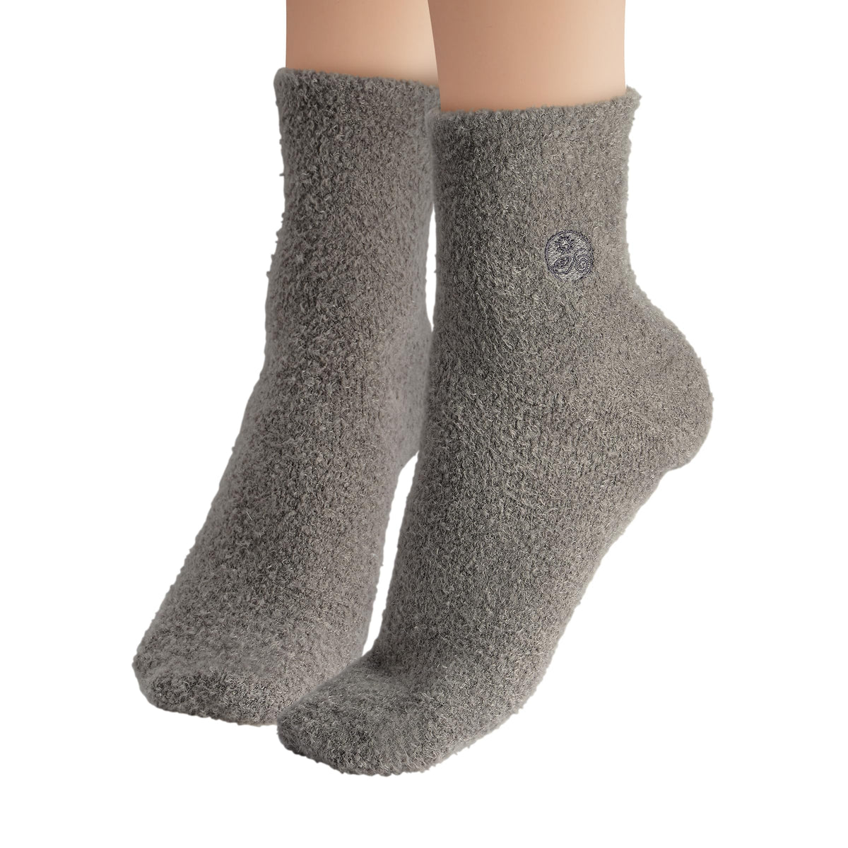 Earth Therapeutics worn on feet to show fit and soothing comfort in use