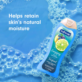 Softsoap bottle in hand showing 591 mL size and travel-friendly benefit