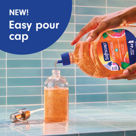 Softsoap pouring into a dispenser illustrating mess-free transfer and convenience