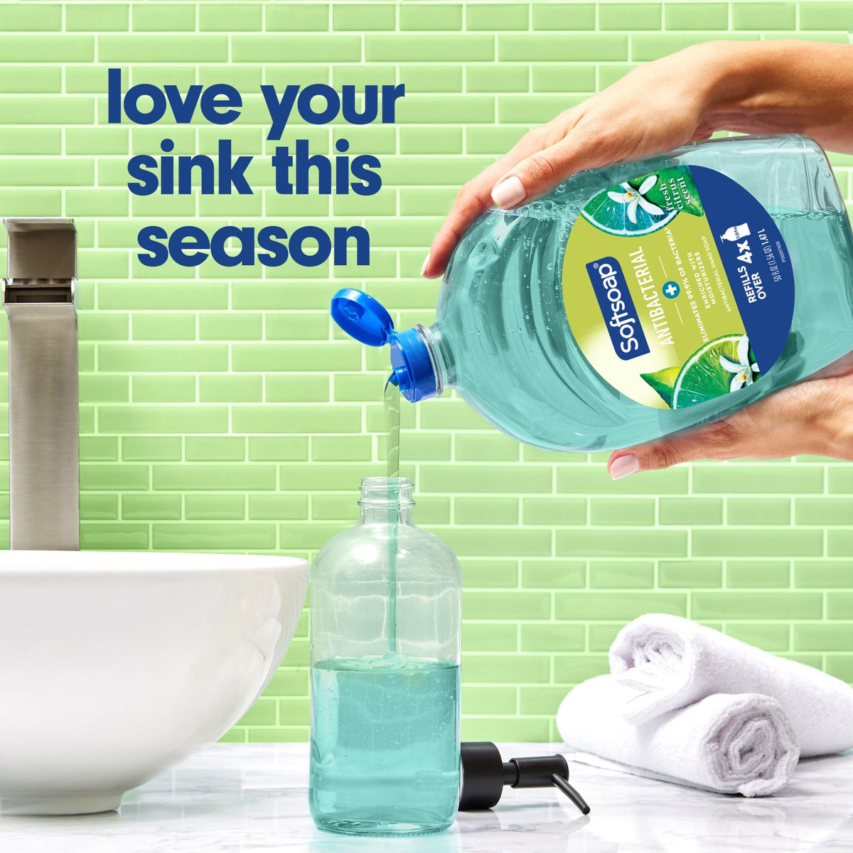 Softsoap 50 oz bottle beside common household item for size and long-lasting benefit