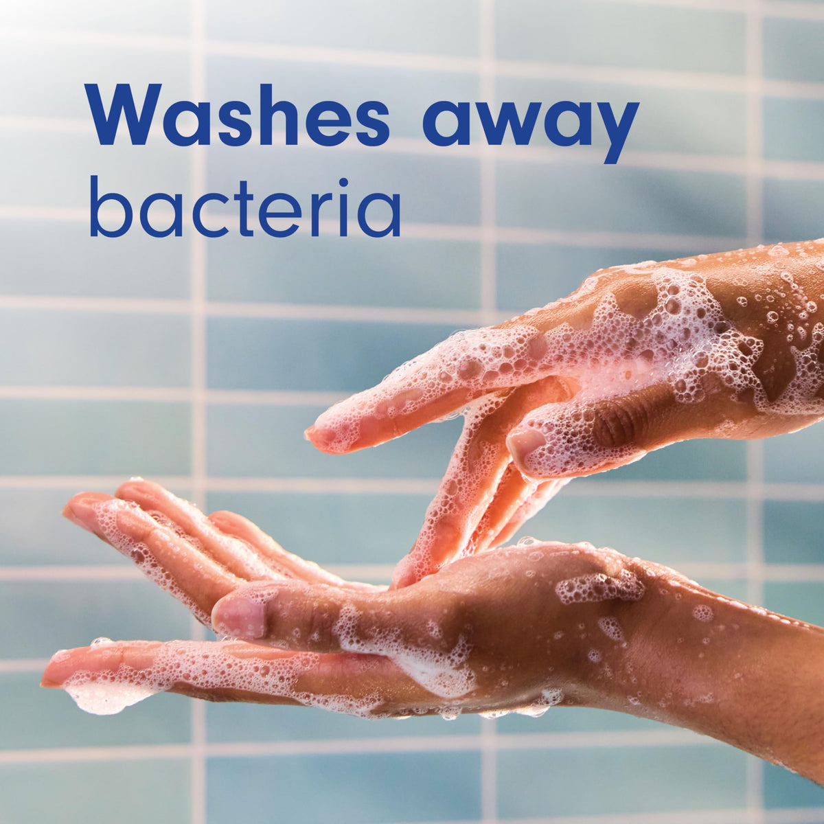 Softsoap foam on hands at sink showing gentle cleansing and moisturizing effect