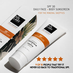 SOL LABS applying sunscreen on hand to show blendability benefit